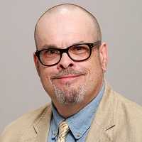 Associate Professor Roger Tuller